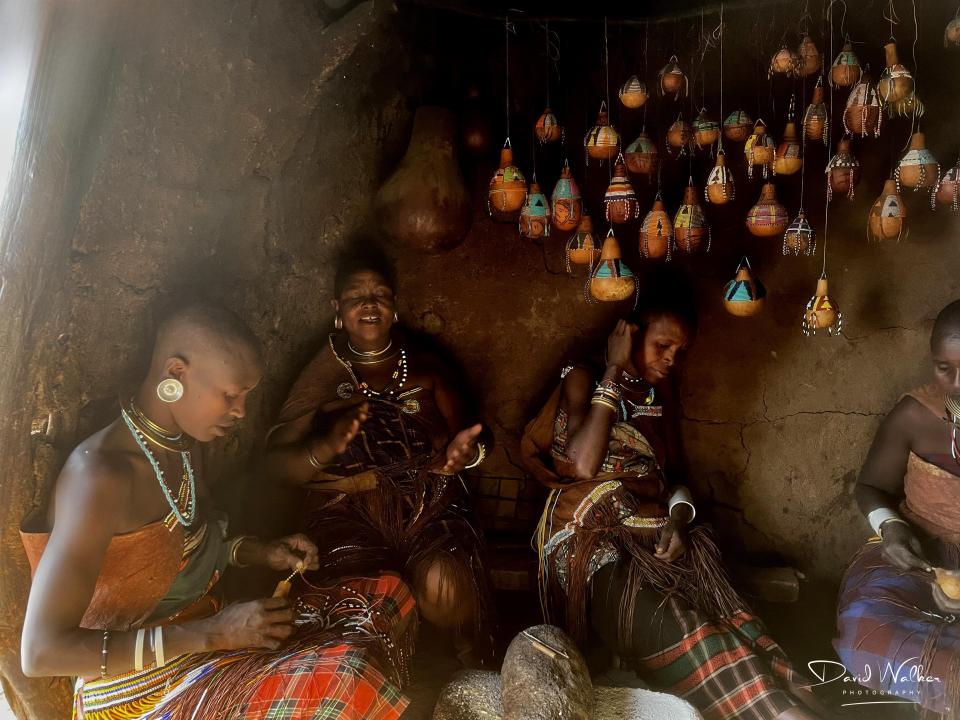 Bead working and singing inside the women’s house, Datoga village