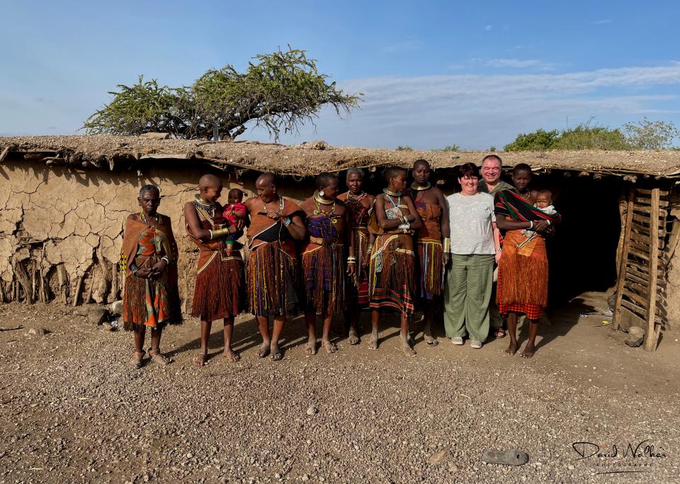 A photograph taken together at the end of our visit, outside the women’s house